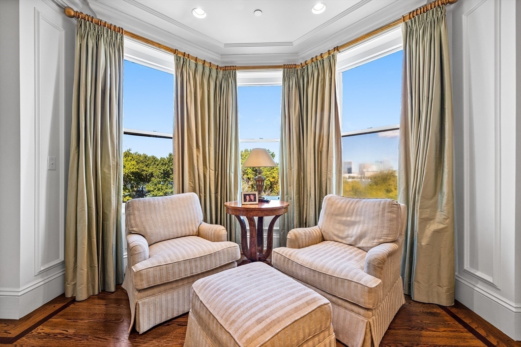 348 Beacon Street, Unit 4 Boston, MA 02116 - Photo 8 of 35 a living room with furniture and a large window