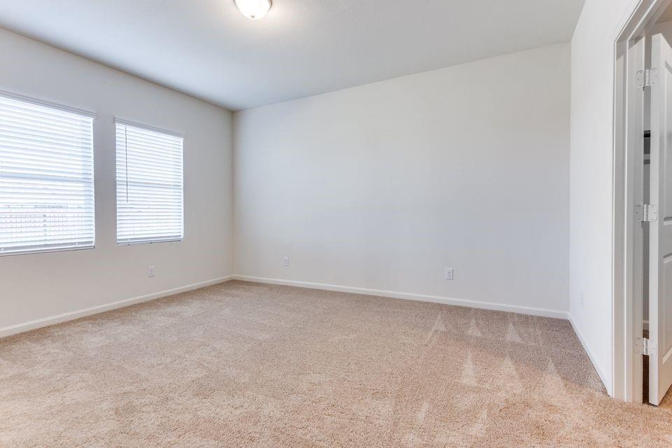 205 Briar Cove Anna, TX 75409 - Photo 5 of 11 Unfurnished room featuring light colored carpet and baseboards