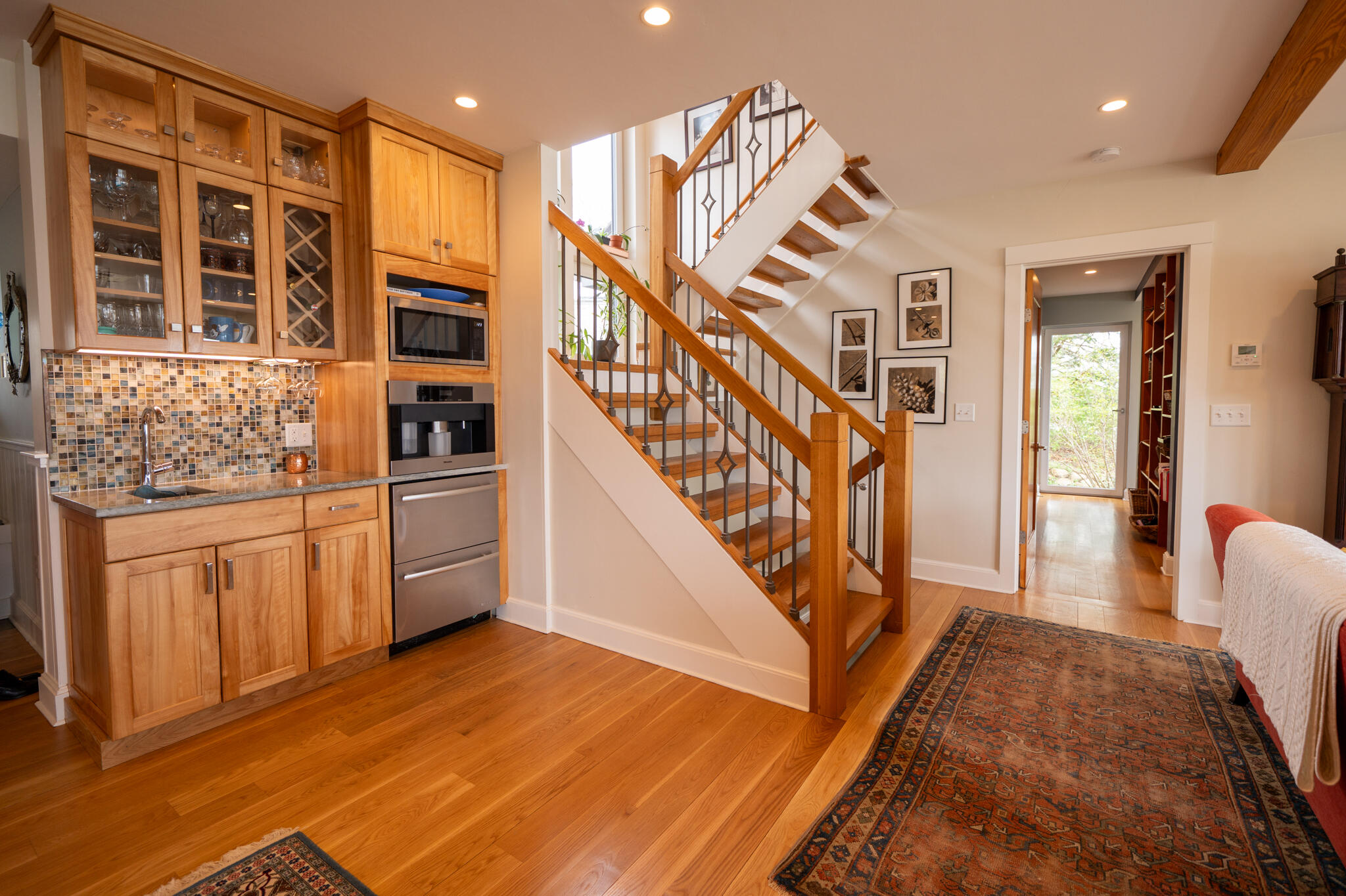 39 Sengekontacket Road Oak Bluffs, MA 02557 - Photo 14 of 32 a view of a hallway with wooden floor and staircase