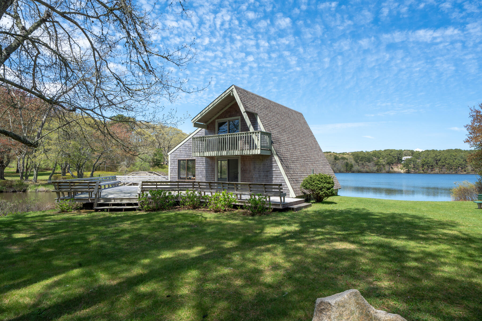 39 Sengekontacket Road Oak Bluffs, MA 02557 - Photo 32 of 32 a front view of a house with a garden