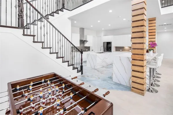 a utility room with sink dryer and washer