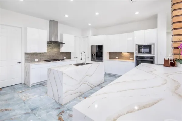 a bedroom with bunk bed and a window