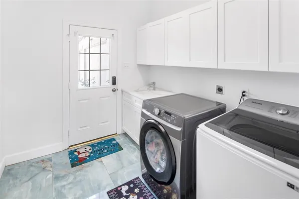 a view of a swimming pool with a lounge chair