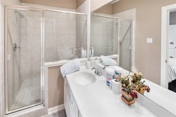 a view of a room with lots of wooden furniture