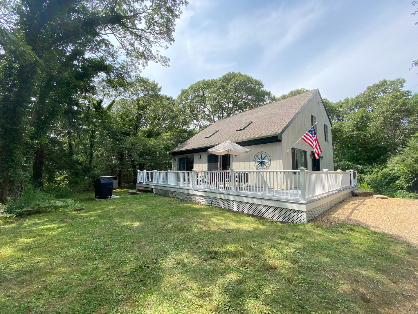 30 Hamblen Way Edgartown, MA 02539 - Photo 22 of 22 a view of a house with a yard and sitting area