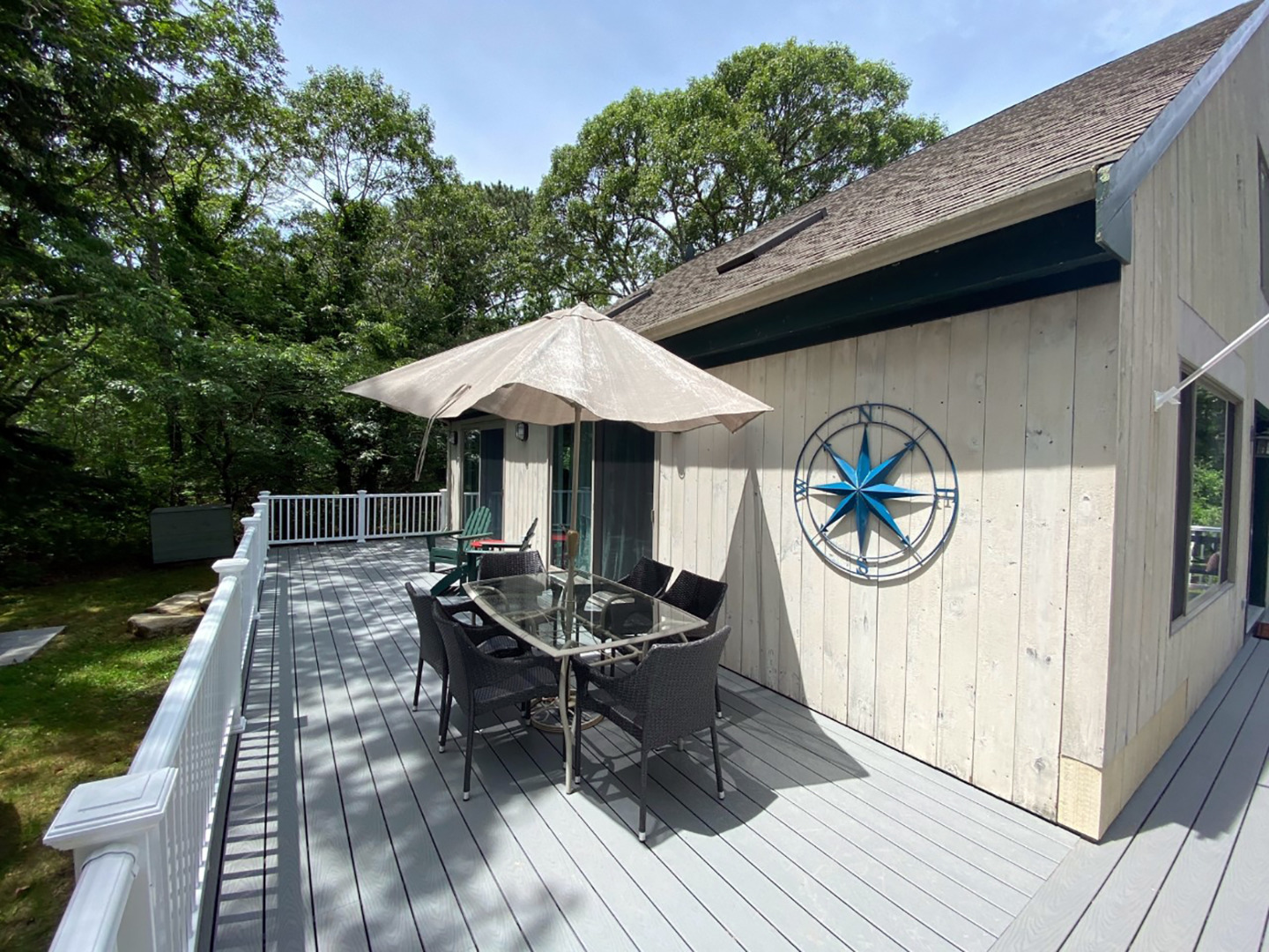 30 Hamblen Way Edgartown, MA 02539 - Photo 4 of 22 a view of house with wooden floor and barbeque oven