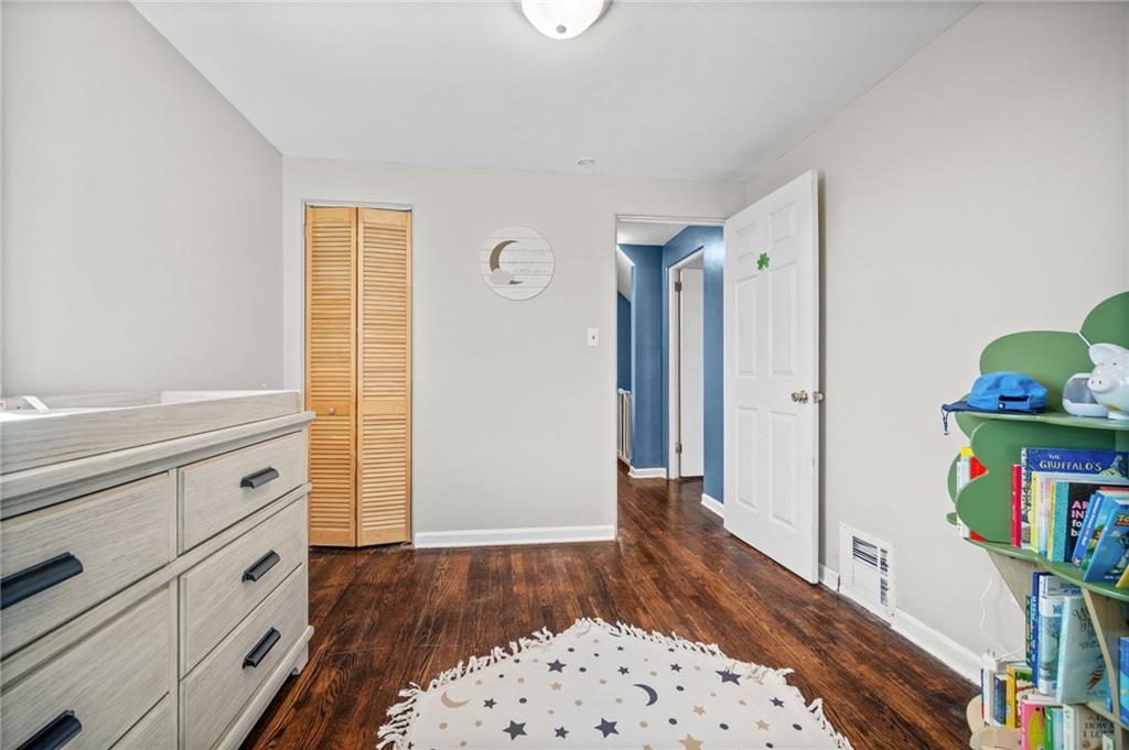 4030 Lebanon Church Road West Mifflin, PA 15122 - Photo 25 of 45 a view of a bedroom with wooden floor and furniture