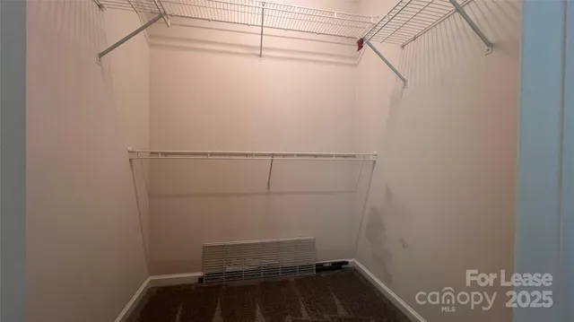 a view of a room with racks on the wall