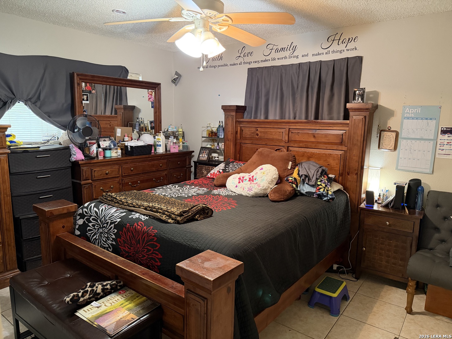 5014 Binz-Engleman Road San Antonio, TX 78219 - Photo 11 of 21 a bedroom with furniture and a tv