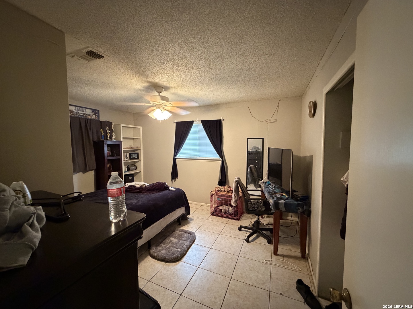 5014 Binz-Engleman Road San Antonio, TX 78219 - Photo 14 of 21 a room with gym equipment and a large window