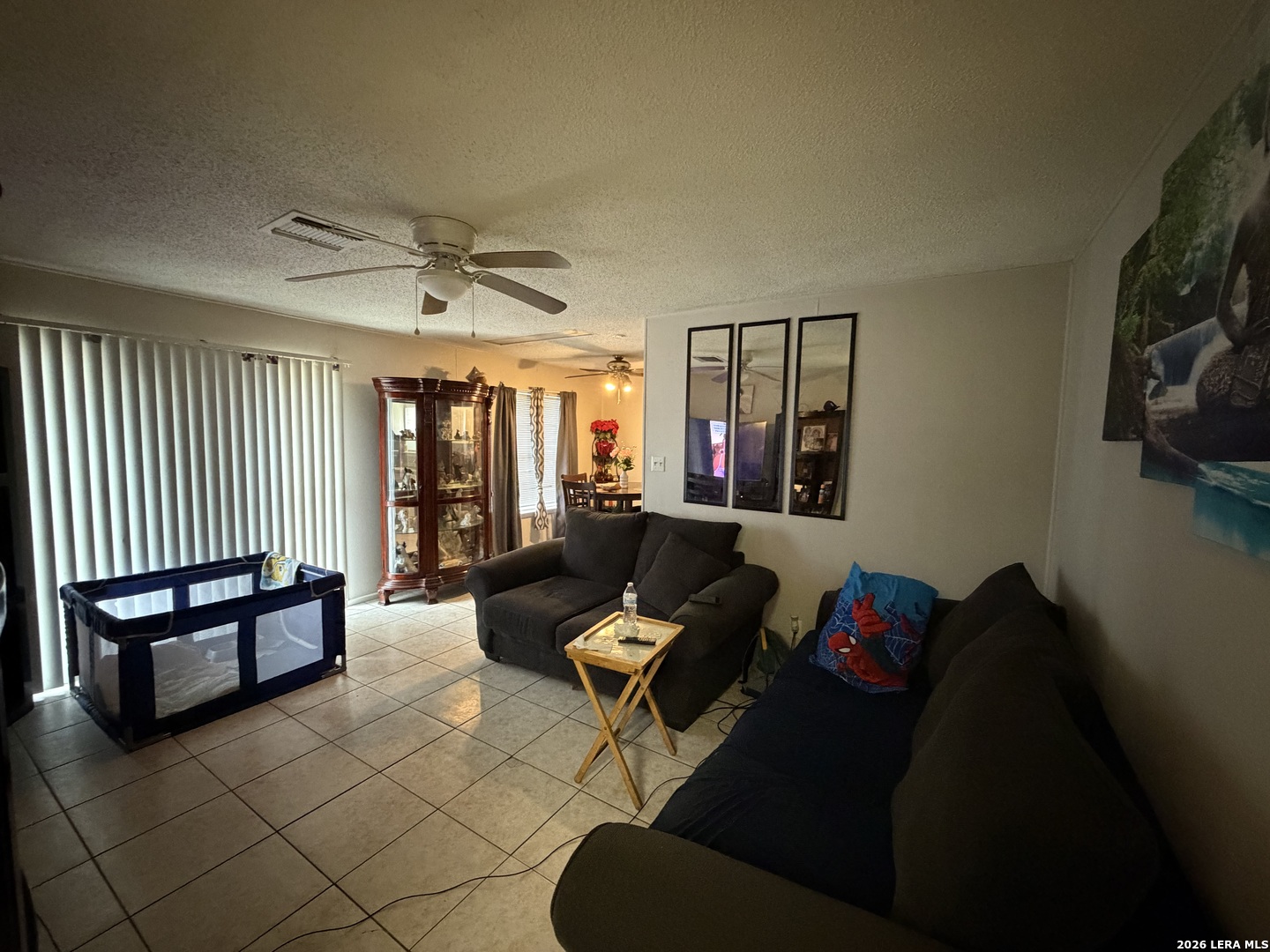 5014 Binz-Engleman Road San Antonio, TX 78219 - Photo 3 of 21 a living room with furniture and a flat screen tv