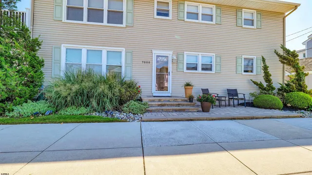 a house view with a outdoor space