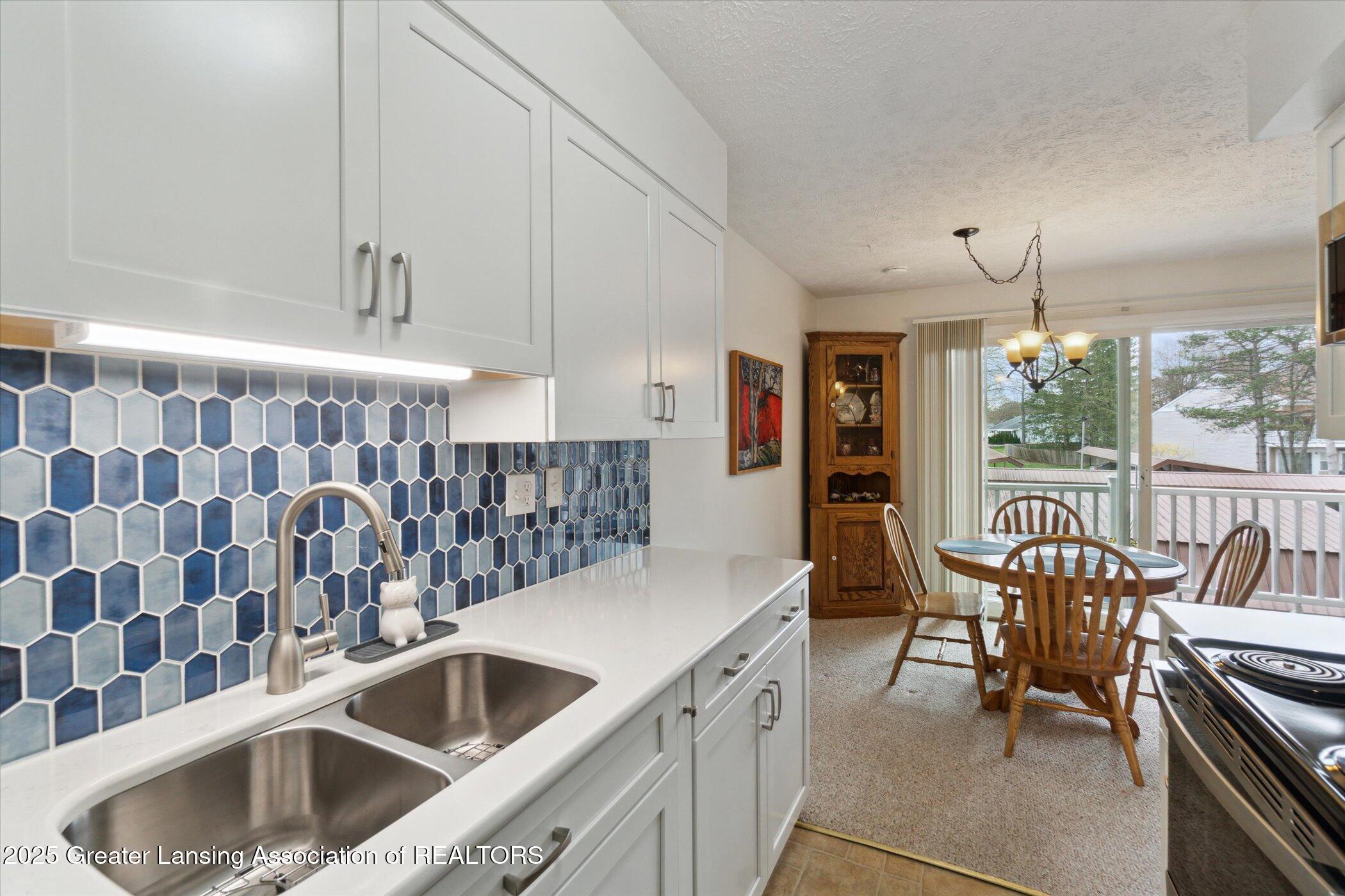 2034 Hamilton Road, Unit 206 Okemos, MI 48864 - Photo 11 of 27 18-2034-Hamilton-Rd-Okemos-MI-48864-Wind