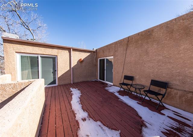 502 West Cheyenne Road Colorado Springs, CO 80906 - Photo 30 of 35 Upper deck has access from both bedrooms