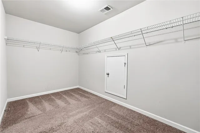 a view of a room with racks on the wall