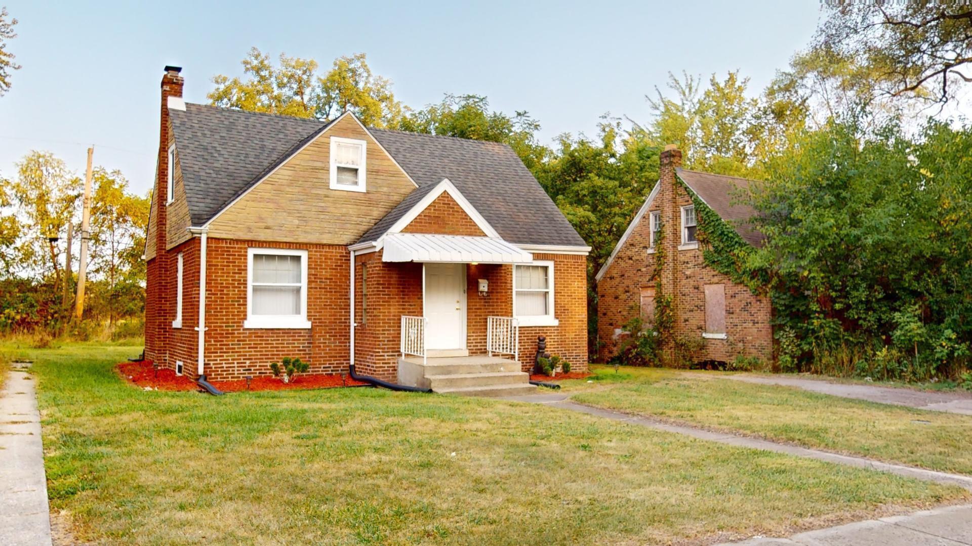 4377 Kentucky Street Gary, IN 46409 - Photo 2 of 20 a view of a house with backyard and garden