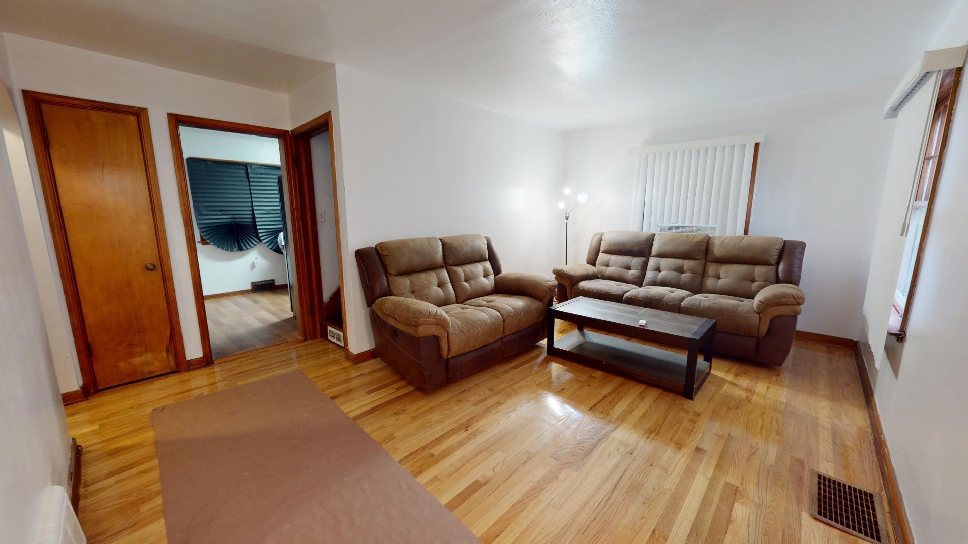4377 Kentucky Street Gary, IN 46409 - Photo 4 of 20 a living room with furniture and a rug