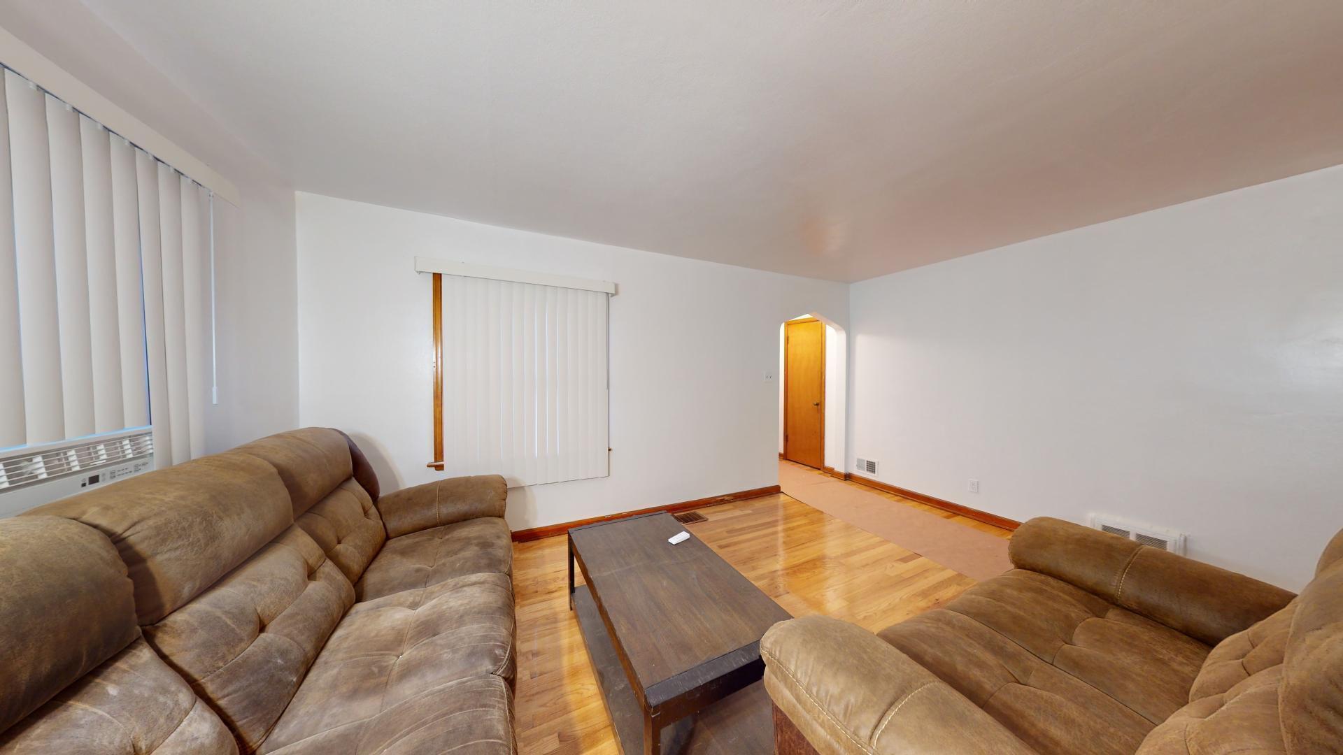 4377 Kentucky Street Gary, IN 46409 - Photo 5 of 20 a living room with a couch and a window