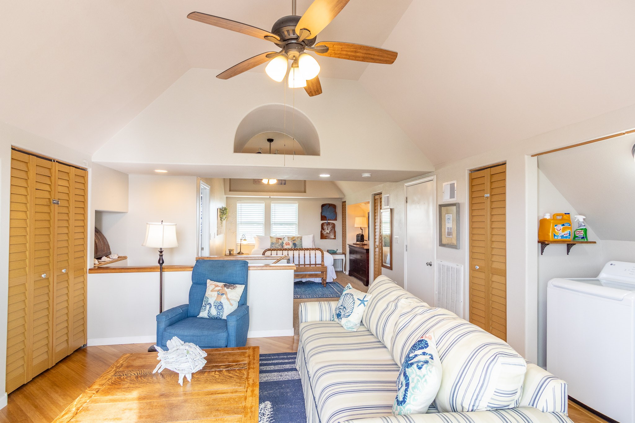 16518 Jean Lafitte Road Jamaica Beach, TX 77554 - Photo 18 of 43 a living room with furniture and a chandelier