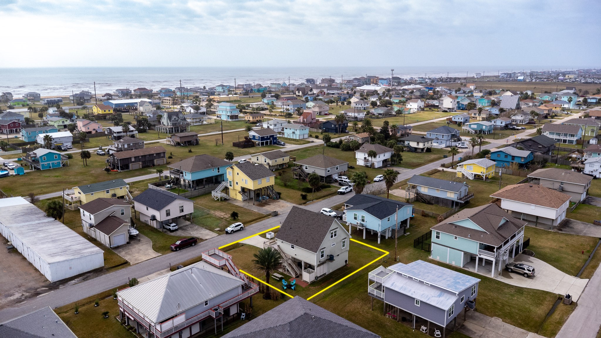 16518 Jean Lafitte Road Jamaica Beach, TX 77554 - Photo 2 of 43 an aerial view of a city with lots of residential buildings