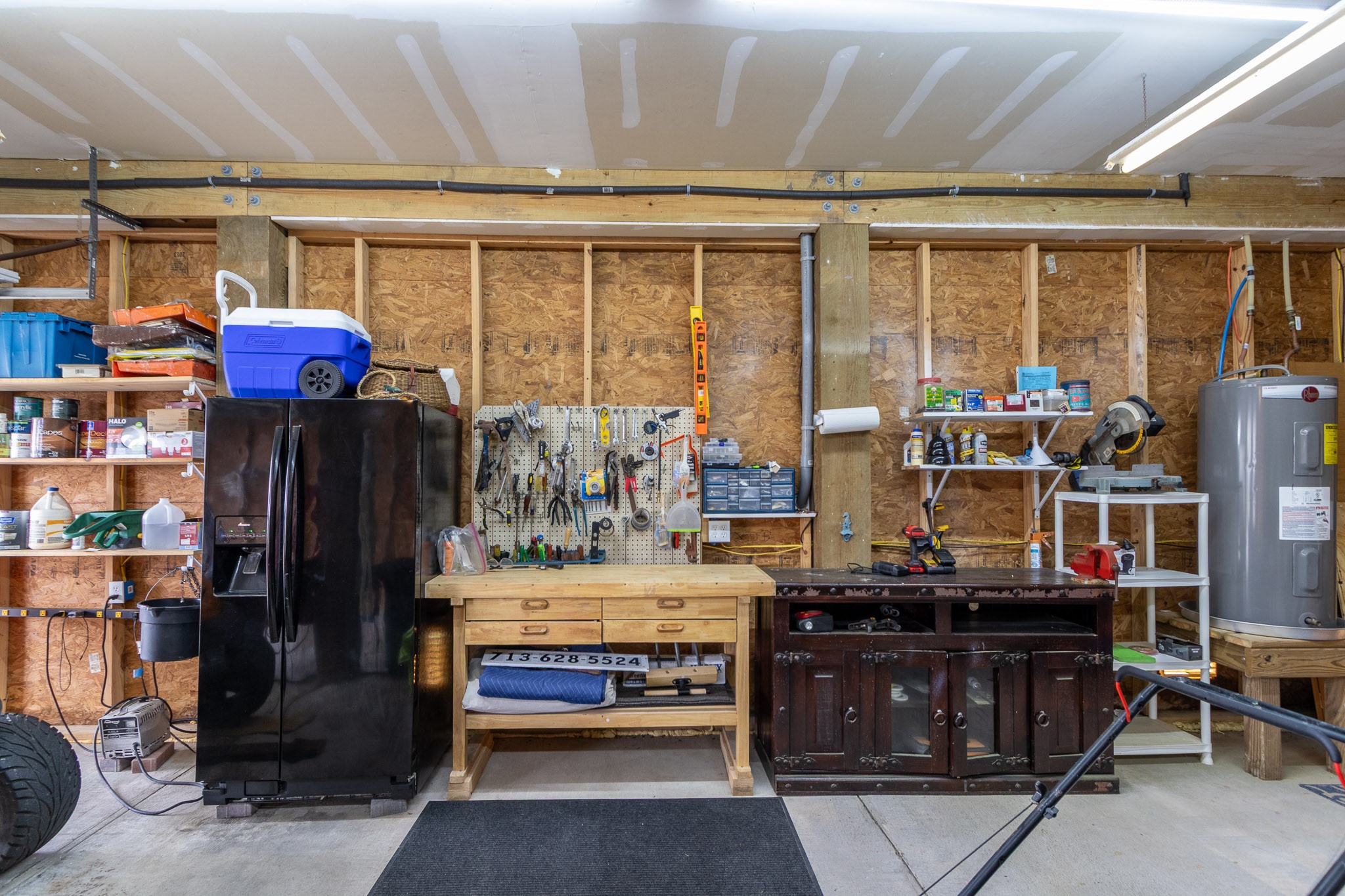 16518 Jean Lafitte Road Jamaica Beach, TX 77554 - Photo 40 of 43 a room with lots of different colored cloths