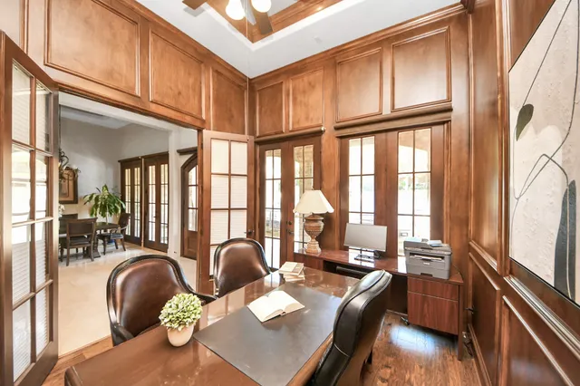 a living room with furniture fireplace and flat screen tv
