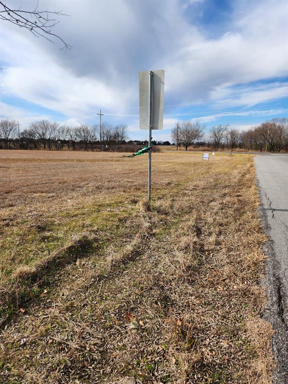 10.32 North Ray Roberts Parkway North Tioga, TX 76271 - Photo 16 of 16 a view of a large body of water with a building in the background