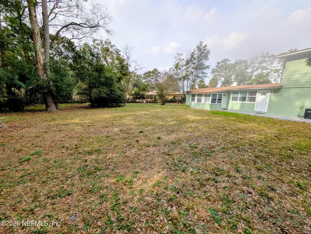 a house view with garden space