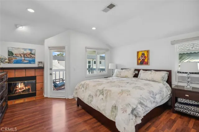 a bathroom with a granite countertop shower a sink and a mirror