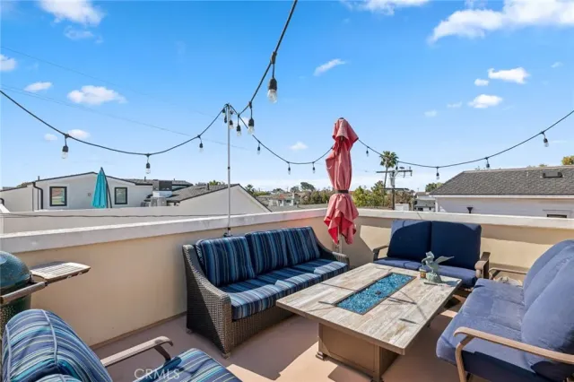 an aerial view of a house with a backyard