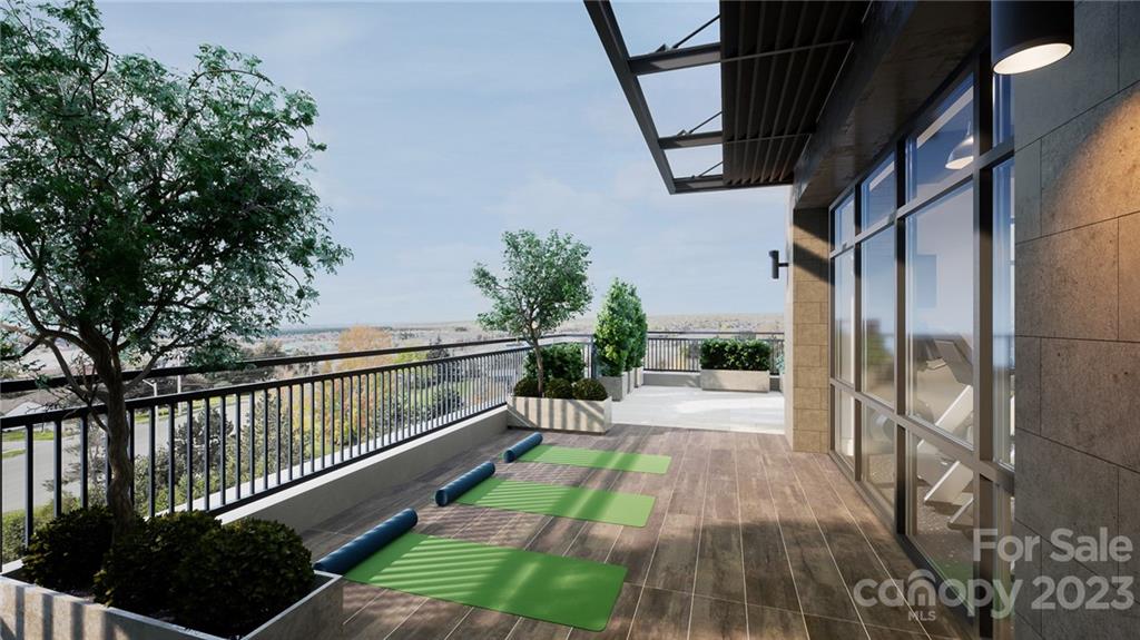 a view of balcony with wooden floor