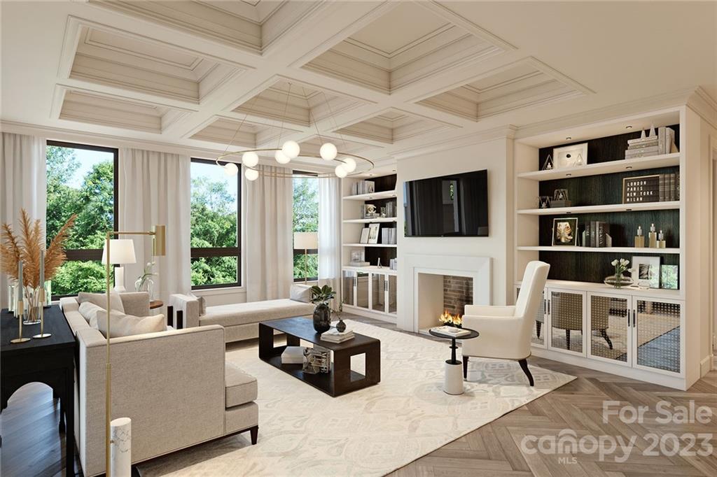 130 Cherokee Road, Unit 103 Charlotte, NC 28207 - Photo 14 of 29 a living room with furniture a rug a flat screen tv and a large window