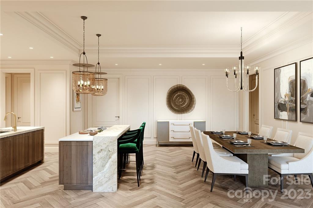 130 Cherokee Road, Unit 103 Charlotte, NC 28207 - Photo 18 of 29 a kitchen with a table and chairs