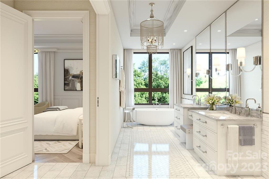 130 Cherokee Road, Unit 103 Charlotte, NC 28207 - Photo 23 of 29 a large spacious bathroom with a large tub and shower