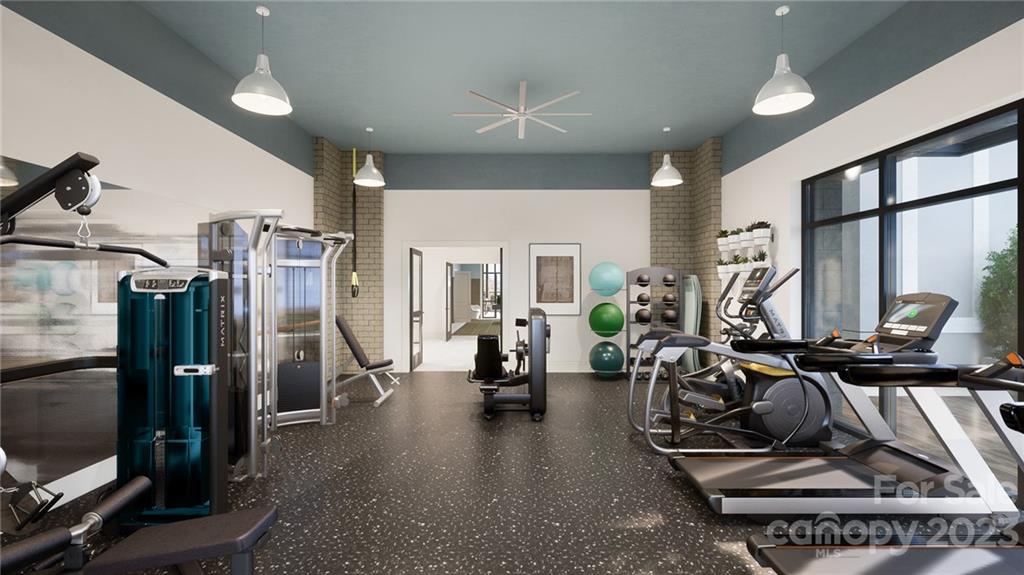 130 Cherokee Road, Unit 103 Charlotte, NC 28207 - Photo 27 of 29 a view of a room with gym equipment