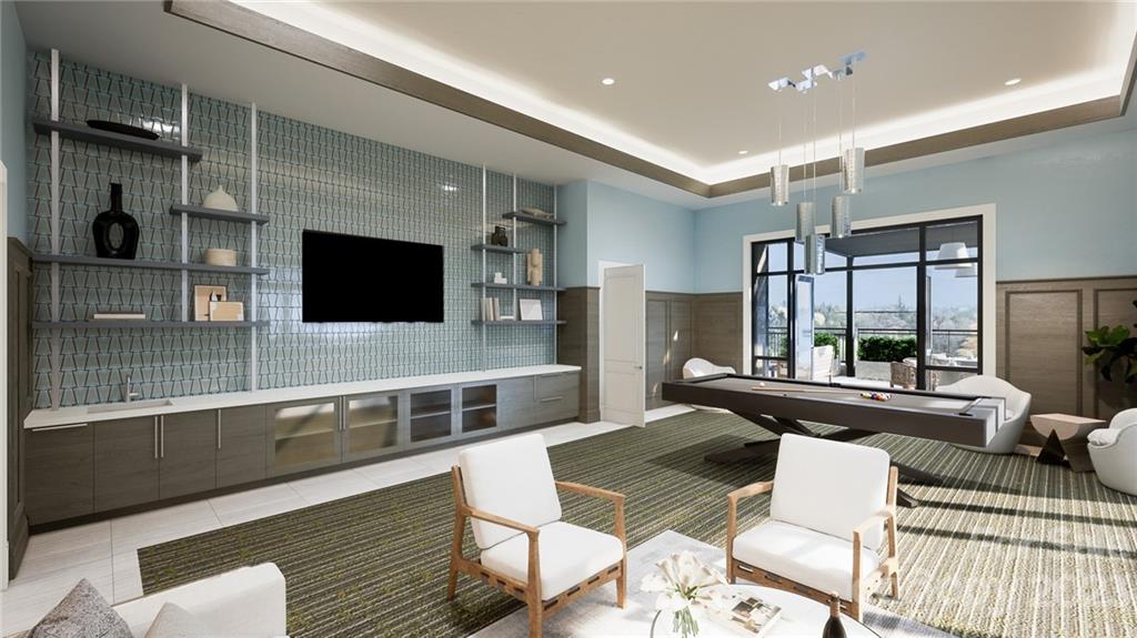 130 Cherokee Road, Unit 103 Charlotte, NC 28207 - Photo 29 of 29 a living room with furniture and a flat screen tv