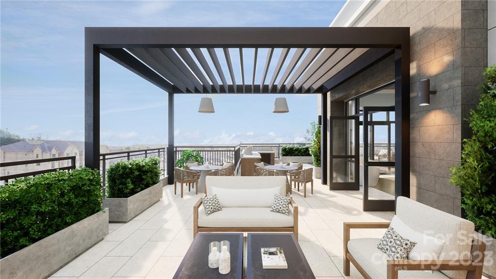 130 Cherokee Road, Unit 103 Charlotte, NC 28207 - Photo 4 of 29 a view of balcony with furniture