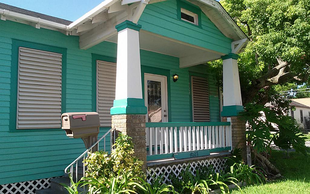 a view of a porch with a bench