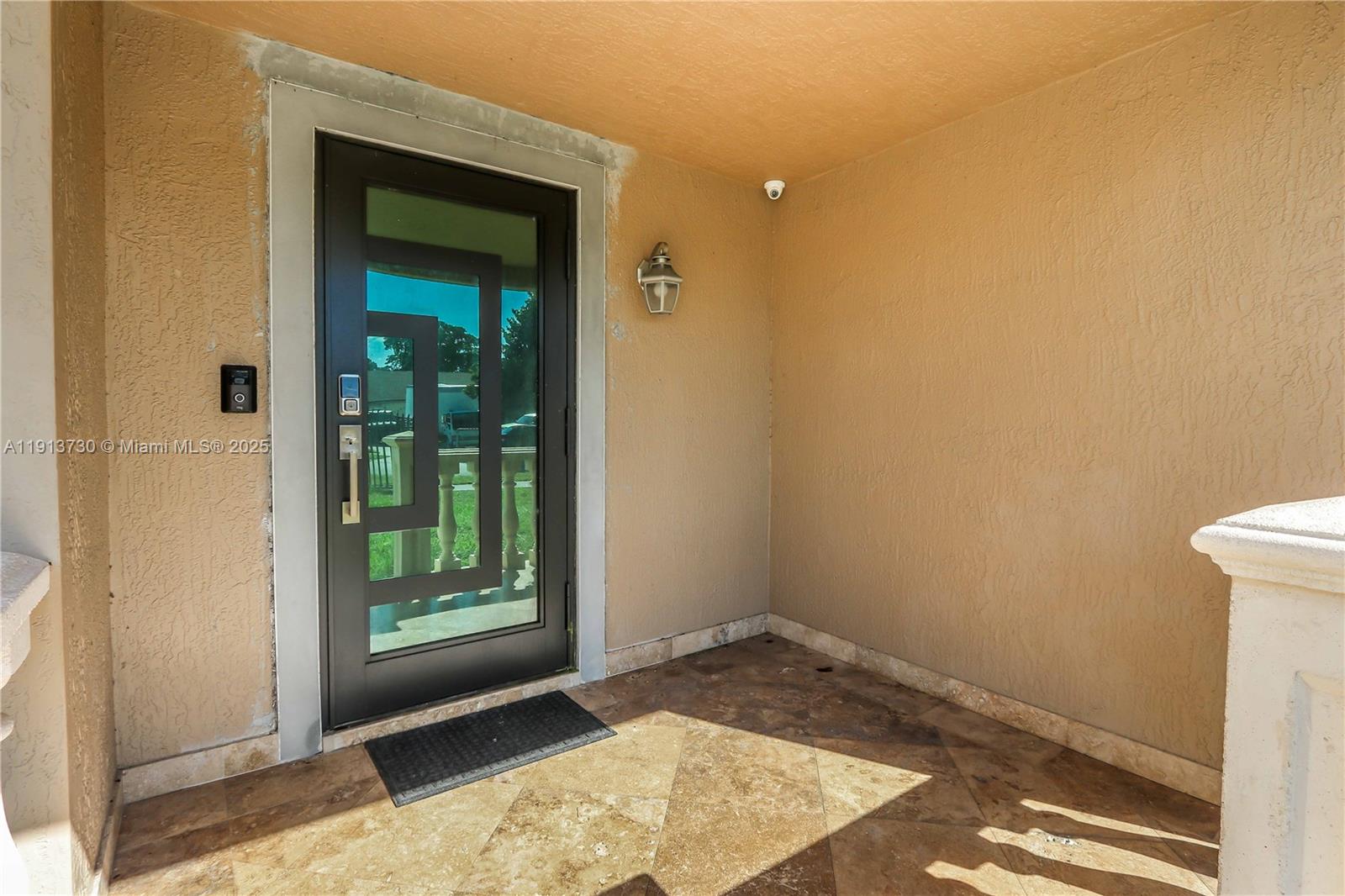 11617 Southwest 171st Street Miami, FL 33157 - Photo 15 of 23 a view of an empty room and window