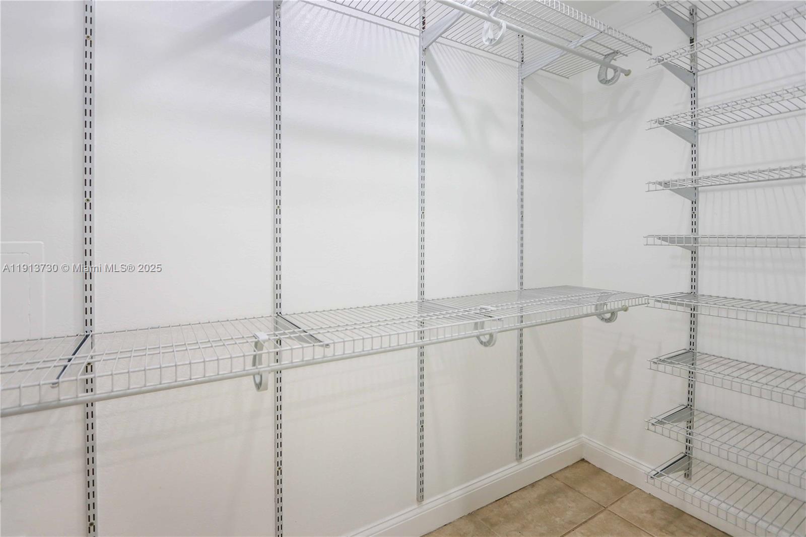 11617 Southwest 171st Street Miami, FL 33157 - Photo 22 of 23 a bathroom with a shower