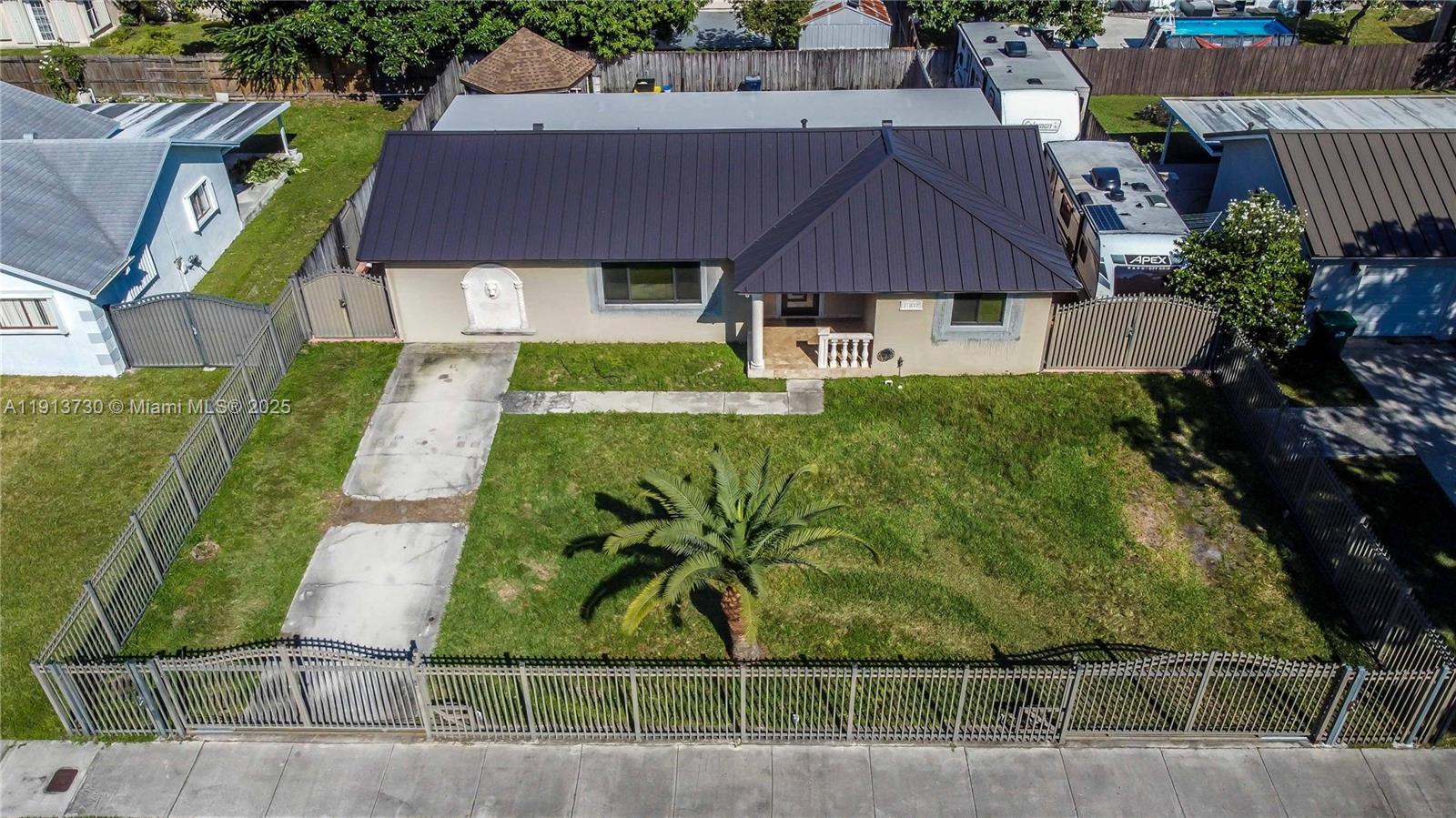 11617 Southwest 171st Street Miami, FL 33157 - Photo 4 of 23 an aerial view of a house