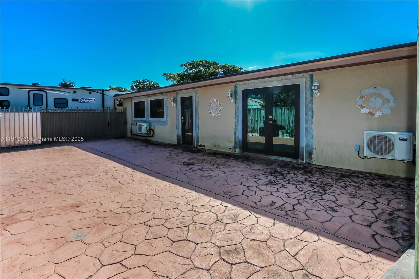 11617 Southwest 171st Street Miami, FL 33157 - Photo 7 of 23 a front view of a house with garden