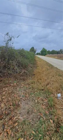 a view of lake with mountain in background