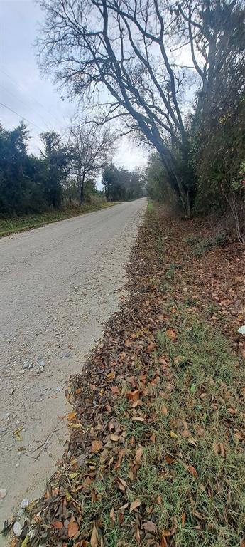 9-10 County Road Lone Oak, TX 75453 - Photo 7 of 12 a view of lake with mountain in background