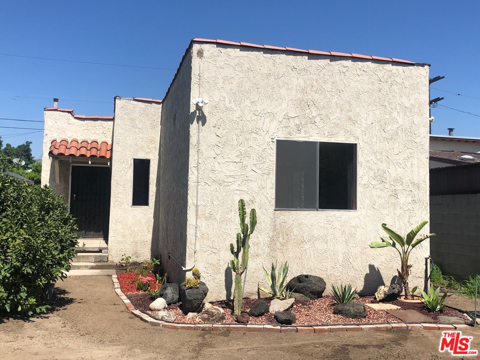 4133 Bemis Street Los Angeles, CA 90039 - Photo 13 of 13 a couple of potted plants sitting in front of a door
