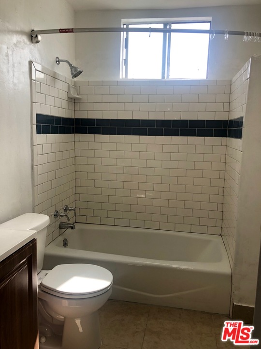 4133 Bemis Street Los Angeles, CA 90039 - Photo 5 of 13 a bathroom with a toilet and a bathtub