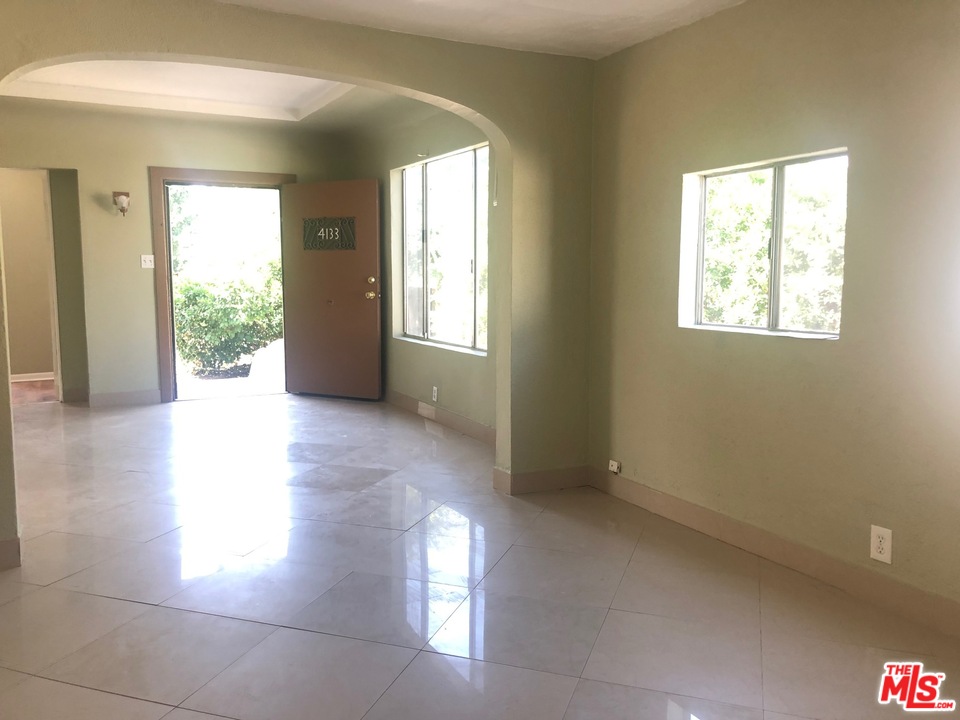 4133 Bemis Street Los Angeles, CA 90039 - Photo 10 of 13 a view of an empty room with wooden floor and a window