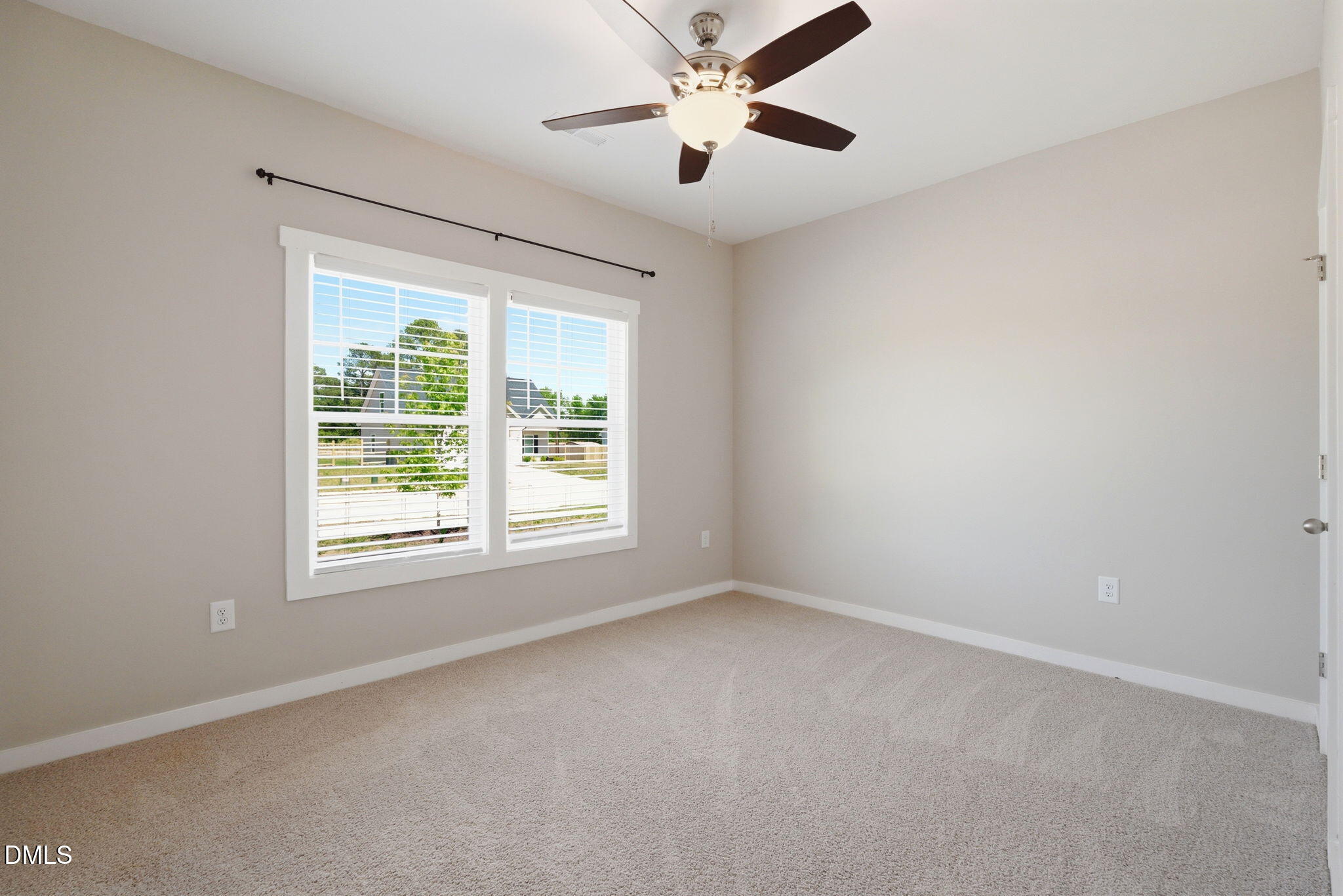 161 Tupelo Dr Spring Spring Hope, NC 27882 - Photo 20 of 28 an empty room with a window and a fan