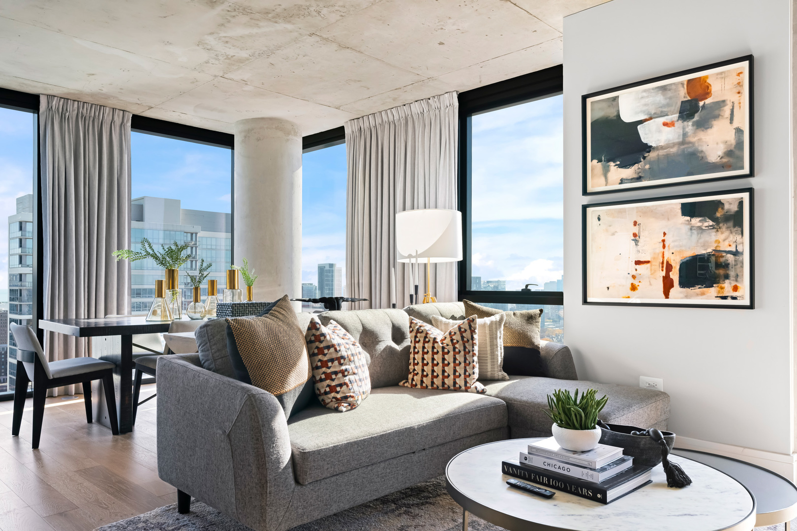 234 West Polk Street, Unit 2609 Chicago, IL 60607 - Photo 7 of 36 a living room with furniture and a large window