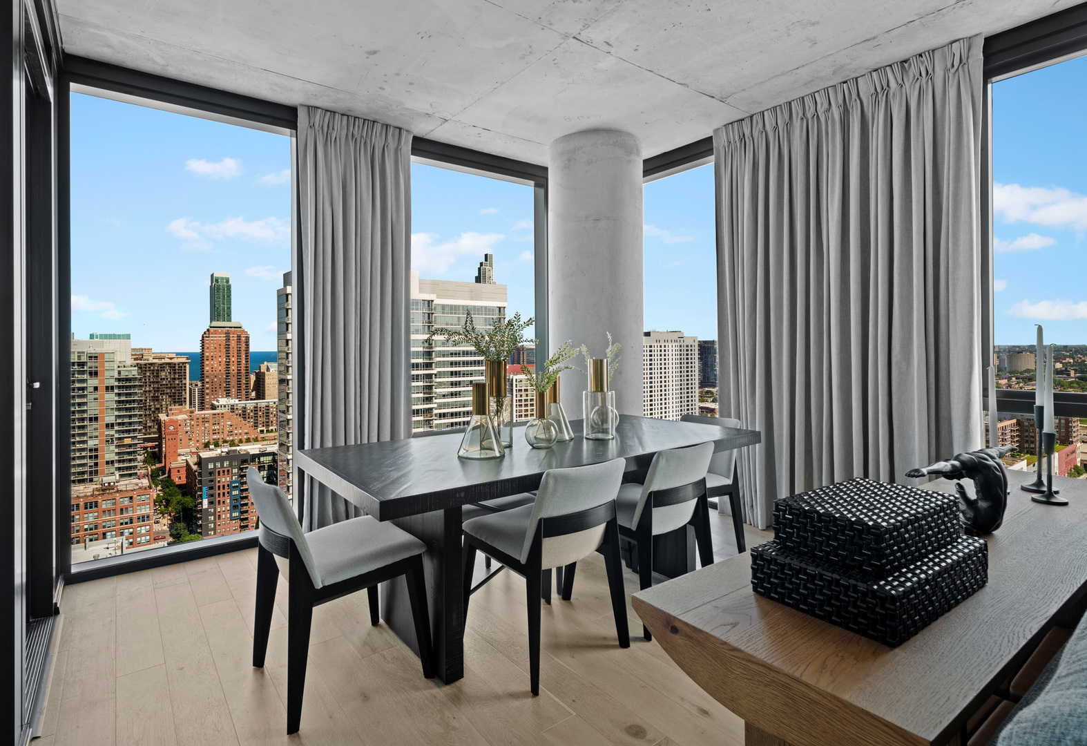 234 West Polk Street, Unit 2609 Chicago, IL 60607 - Photo 8 of 36 a living room with furniture and a large window